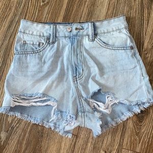 distressed light wash denim shorts